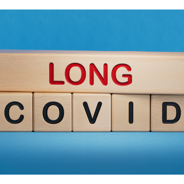 Blocks stacked with LONG on top and COVID spelled out across on individual blocks